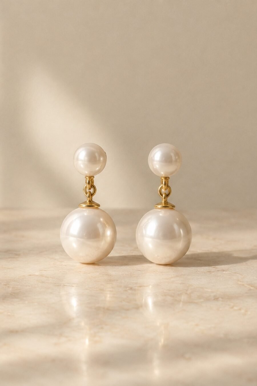 Fenn Pearl Drop Earrings in Ivory / gold-tone