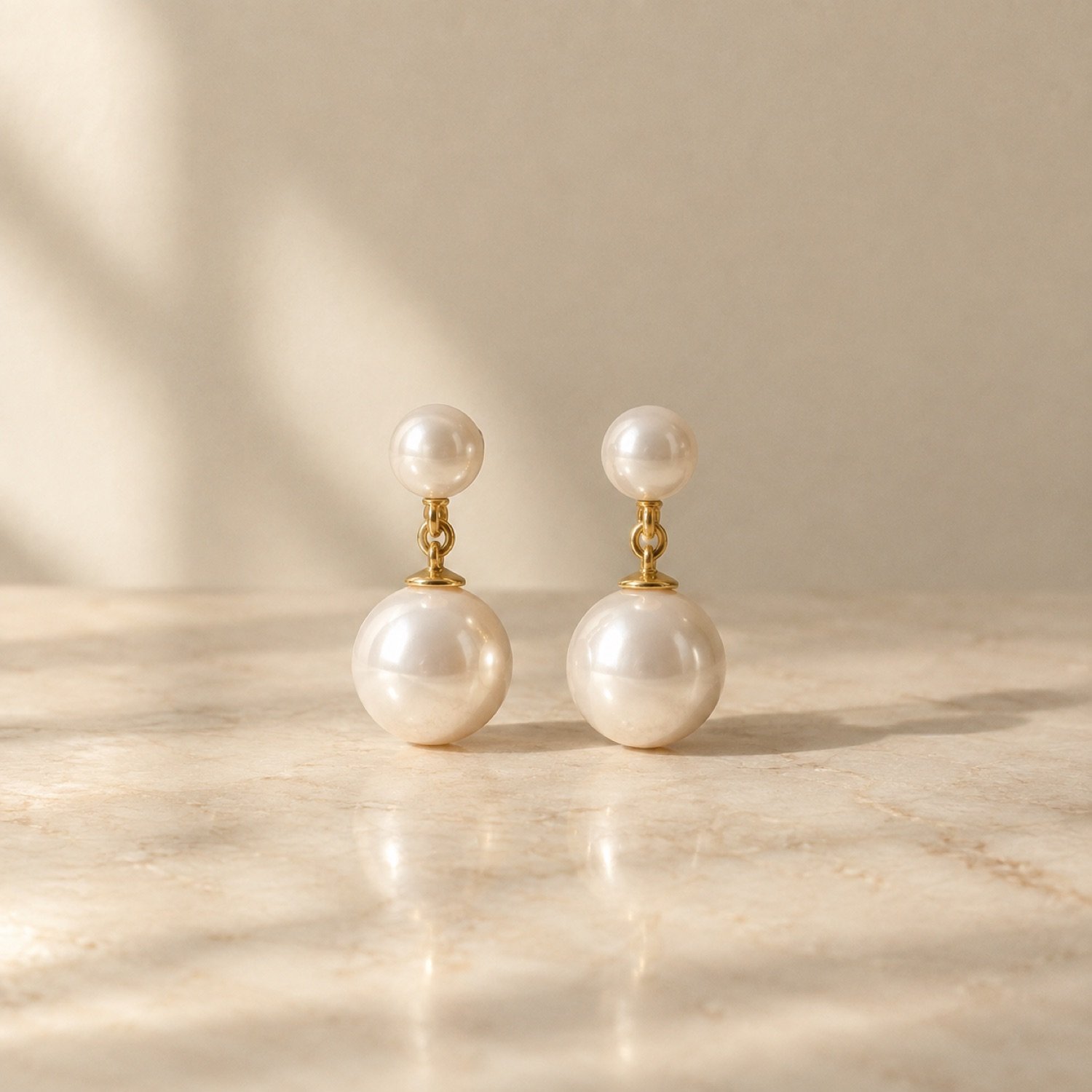 Fenn Pearl Drop Earrings in Ivory / gold-tone