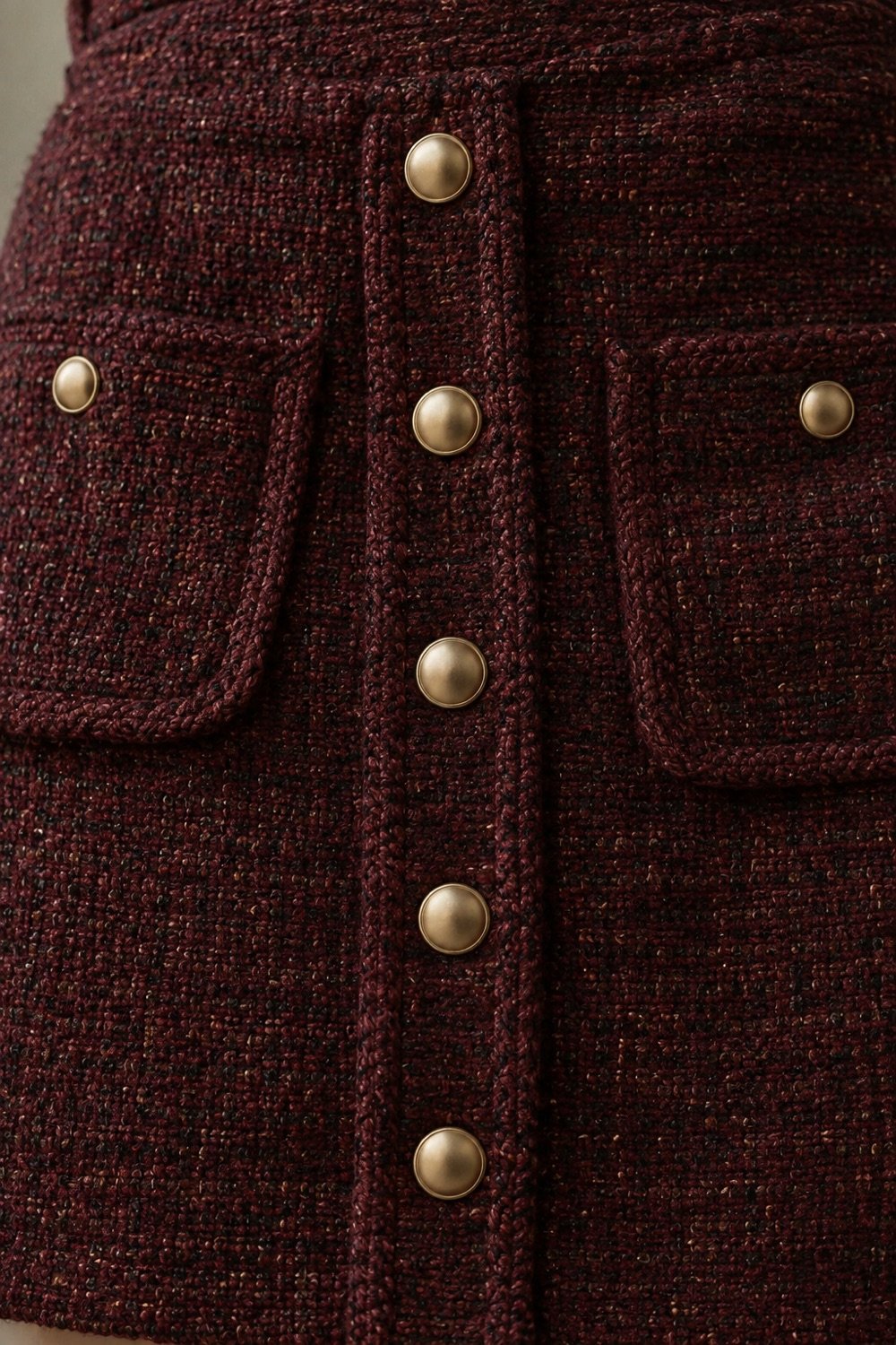 Vanner Button-Front Mini in Oxblood / black fleck — detail